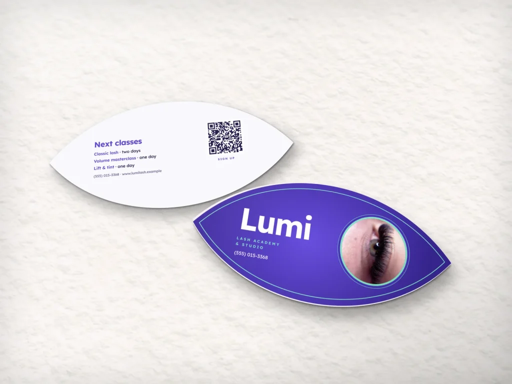 Die-cut business card template DC-02 for a lash and brow studio: Lumi, almond eye shape in violet, lash photo in a mint ring