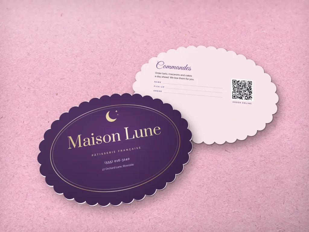 Die-cut business card template DC-11 for a bakery or café: Maison Lune, scalloped plum oval with a crescent moon and pale gold foil