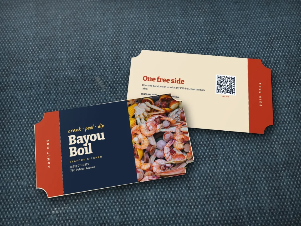 Die-cut business card template DC-17 for a restaurant: Bayou Boil, ticket with notched corners and a tear-off stub, navy, seafood boil photo