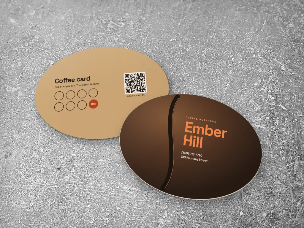 Die-cut business card template DC-18 for a bakery or café: Ember Hill, coffee bean shape with its crease and orange type