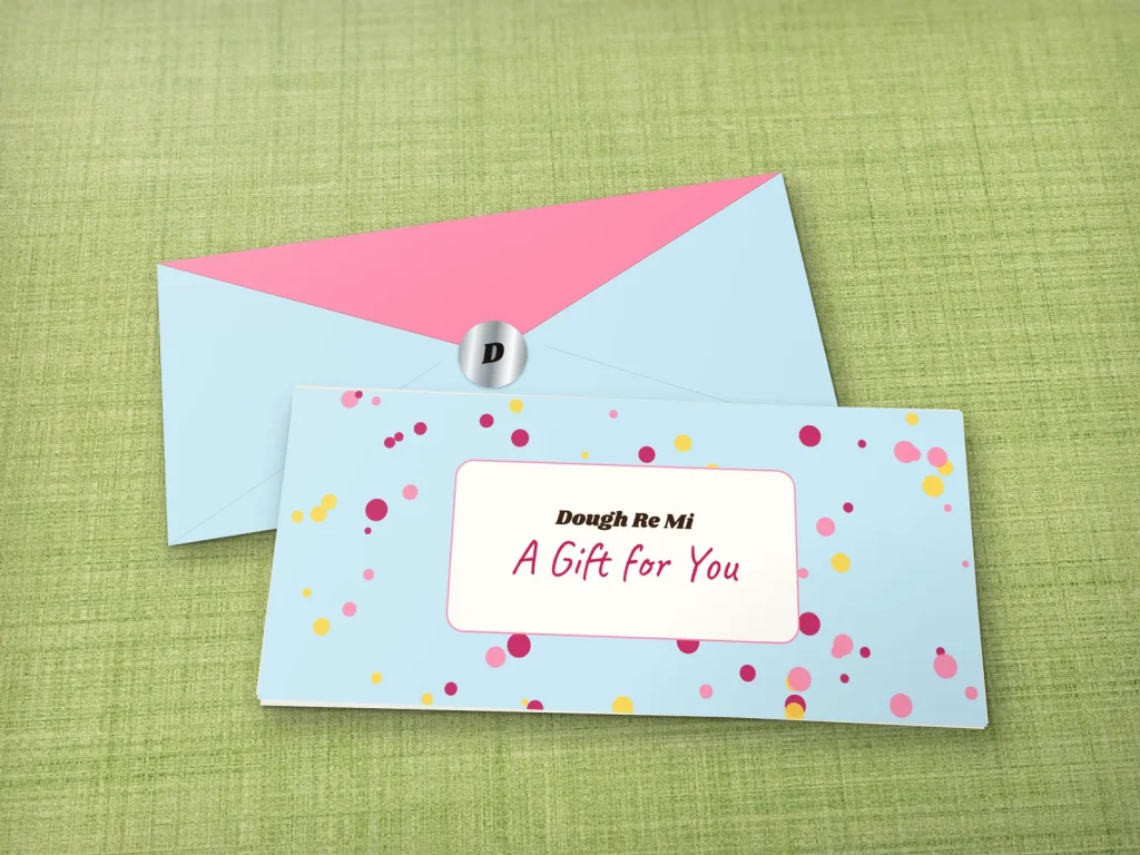 Full-color gift envelope template E4-08 for a bakery or café: Dough Re Mi, sky blue with sprinkle-like dots
