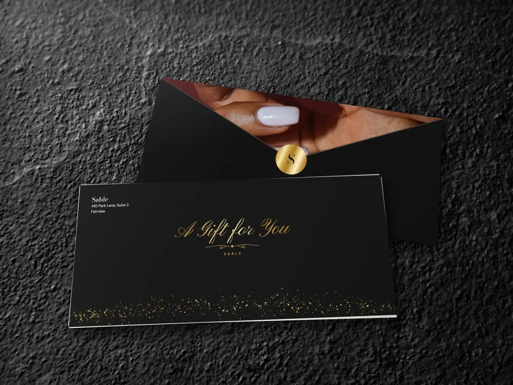 Full-color gift envelope template E4-17 for a nail salon: Sable, black with gold glitter