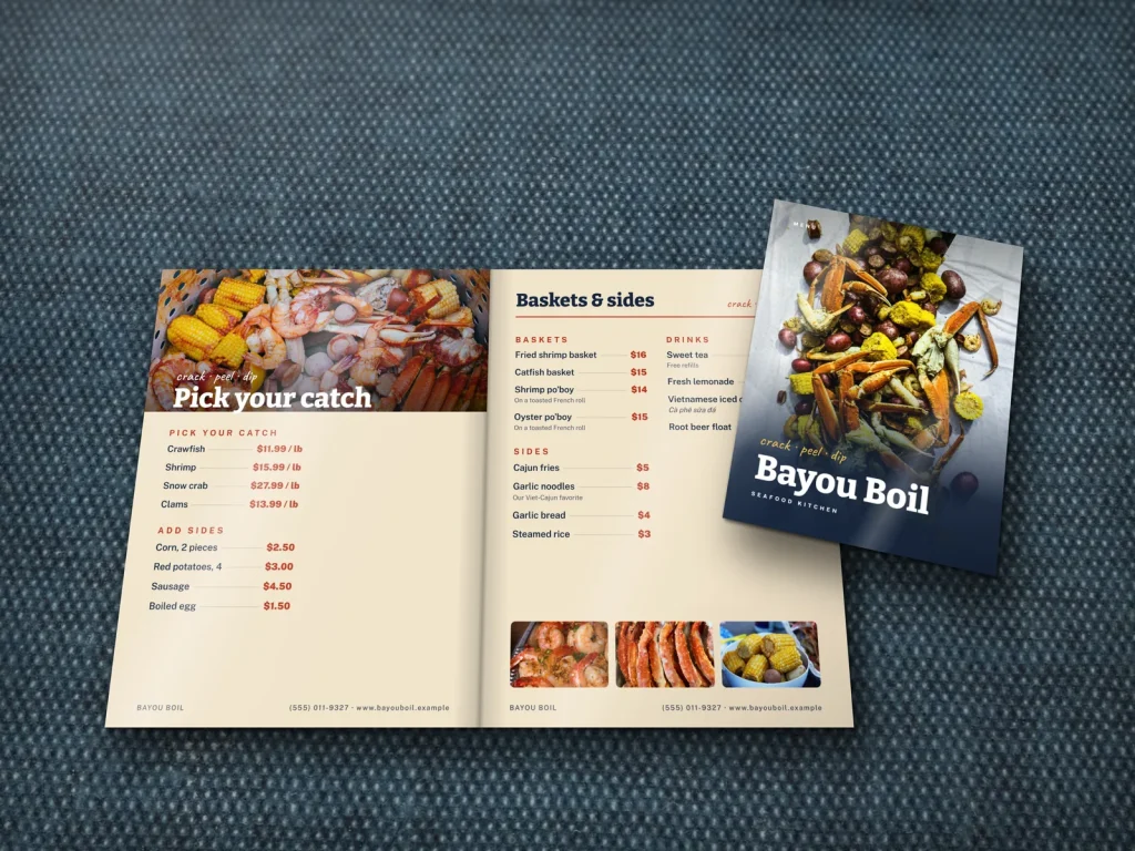 Mẫu menu tráng gương MG-10 cho nhà hàng: Bayou Boil, bìa ảnh mâm hải sản đổ ra bàn, trang chọn món
