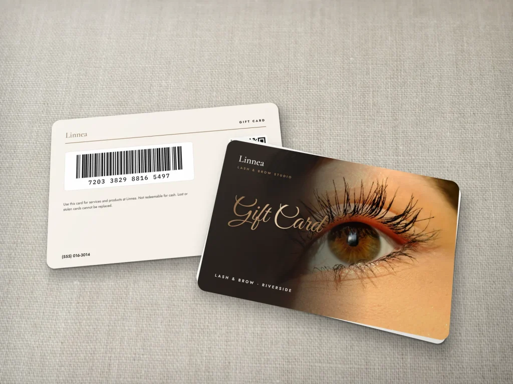PVC card template PV-02 for a lash and brow studio: Linnea, gift card with a lash close-up and bronze foil script