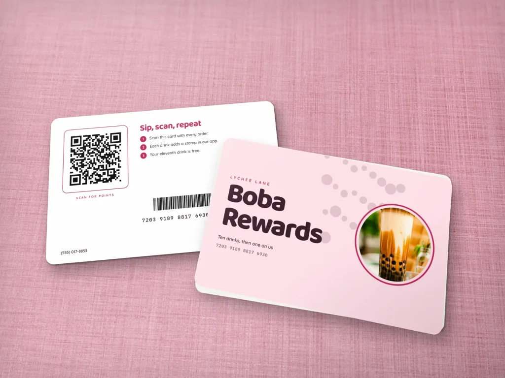 PVC card template PV-10 for a restaurant: Lychee Lane, lychee pink reward card with big type, a boba photo and pearls