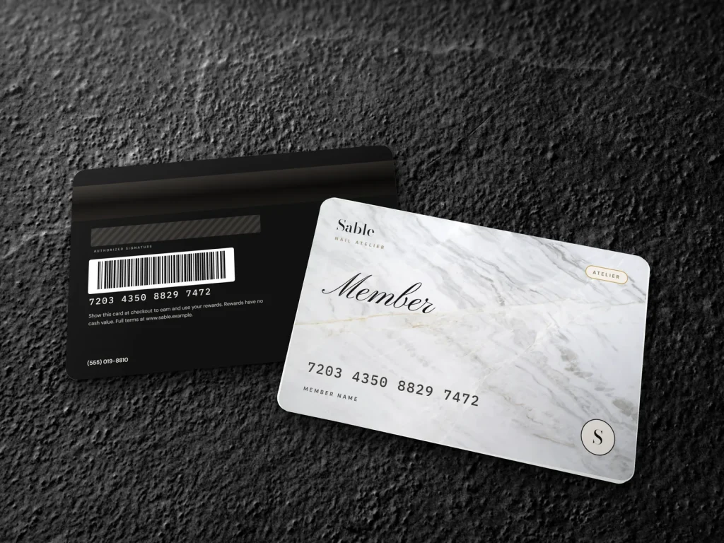 PVC card template PV-18 for a nail salon: Sable, white marble member card with black type and gold foil