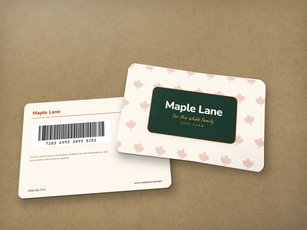 PVC card template PV-20 for a nail salon: Maple Lane, cream gift card with a maple leaf pattern and a forest green badge