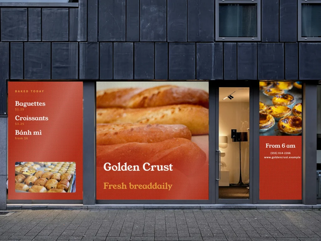 Window graphic template WG-03 for a bakery or café: Golden Crust, brick red with a baguette photo and prices