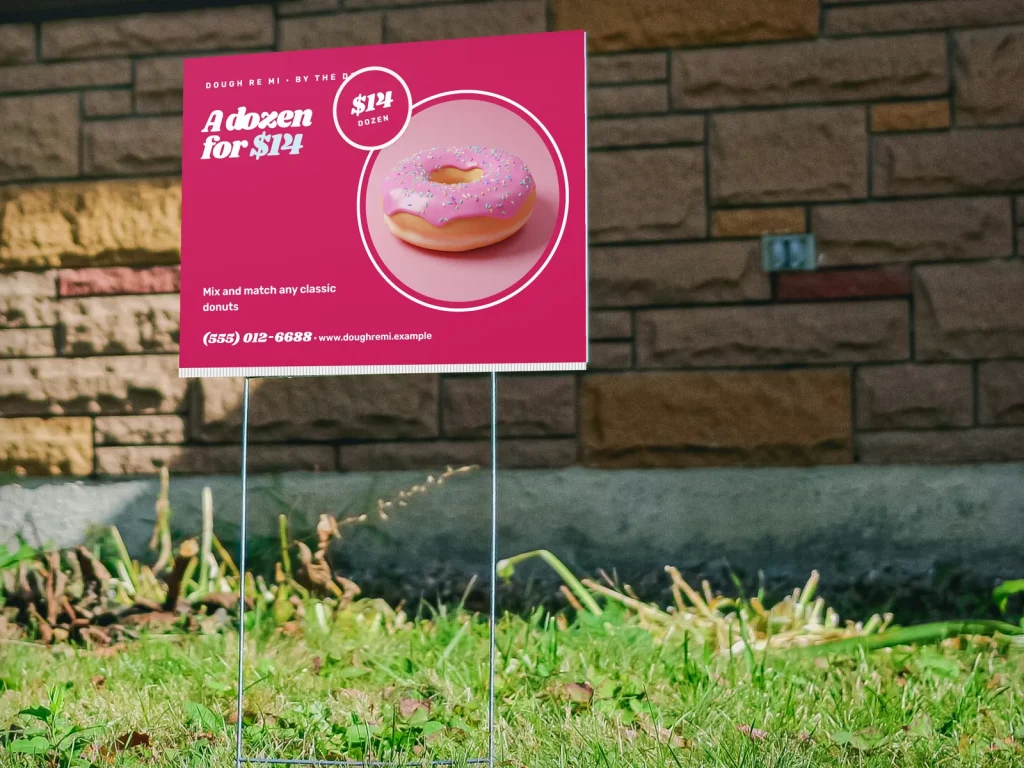 Yard sign template YS-13 for a bakery or café: Dough Re Mi, big pink type with a strawberry donut